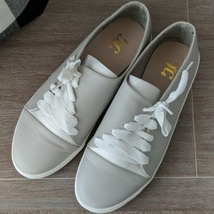 Grey and white sneakers